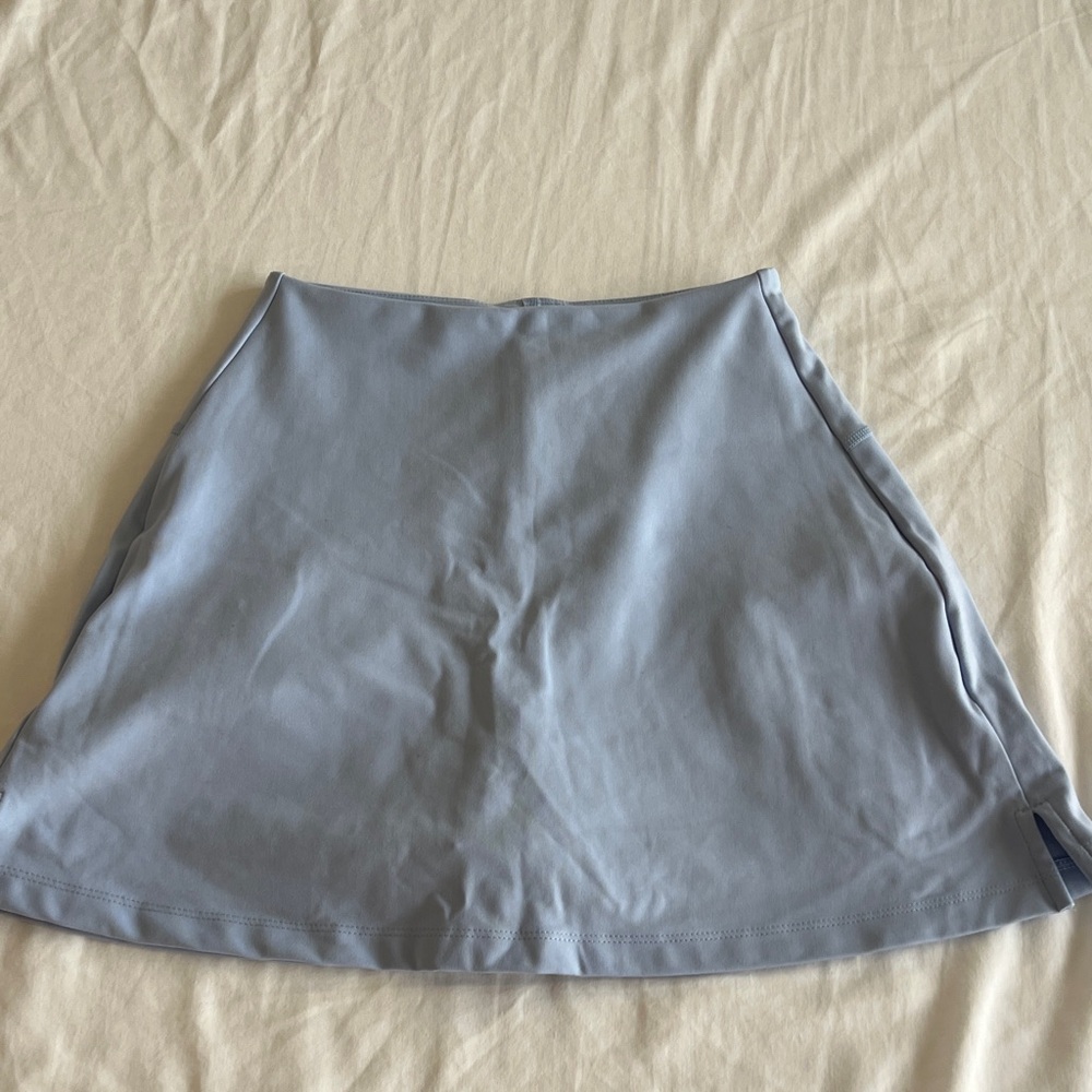 girlfriend collective light blue sports skirt